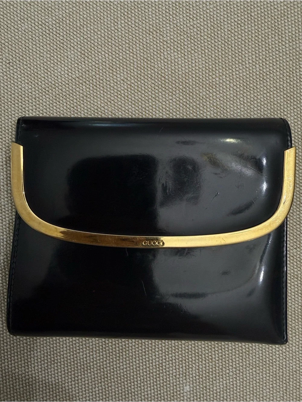 Gucci Black Leather Wallet with Gold Trim